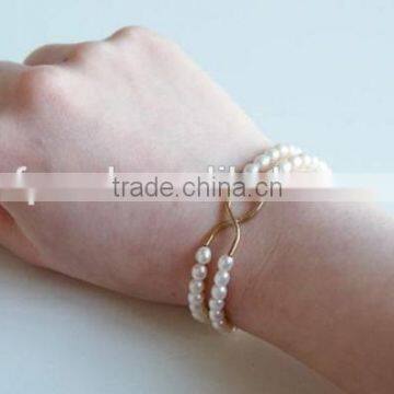 Trendy 4-5mm White Rice Shape Freshwater Pearl Bracelet photo-3