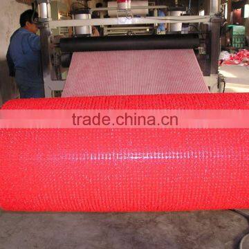 Plastic turf mat machine