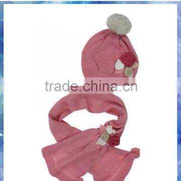 100% acrylic pink knit matching scarf and hat with crochet flower