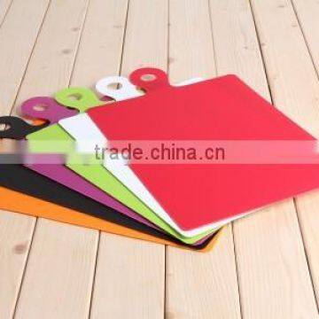 plastic cutting board outside