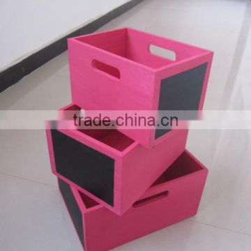 colorful wooden boxes with black board