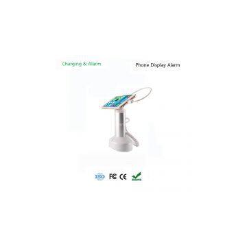 Security alarm for mobile phone on display