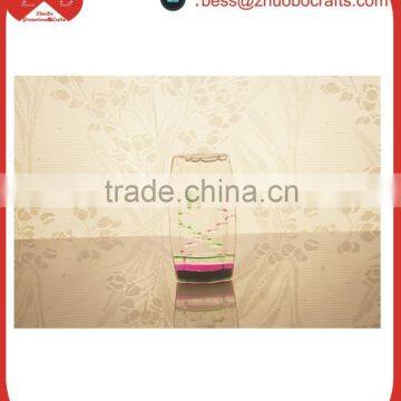 The ellipse 2-color liquid oil hourglass