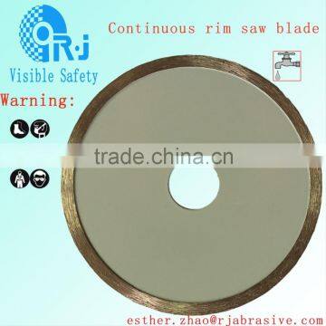 Continuous rim saw blade