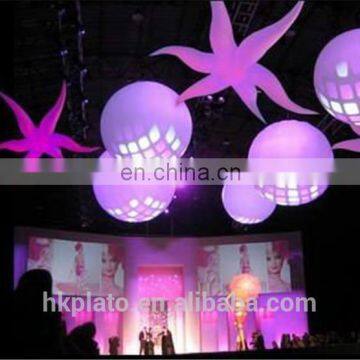 Decorative lighted inflatable star and moon for event
