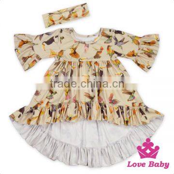 Yiwu lovababy kid dress short front long behind with same fabric bow headband latest design baby frock