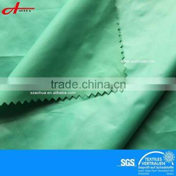 High quality waterproof polyester taffeta fabric OIL CIRE fabric