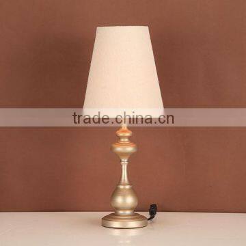 small iron reading lamp with linen shade