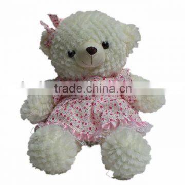 very lovely dressed plush and stuffed bear