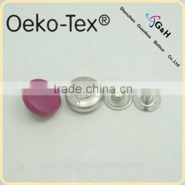 Plastic cap spring snap button