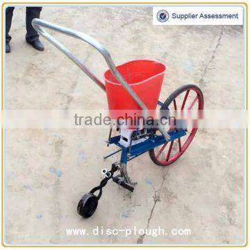 Hand push corn/wheat seeder