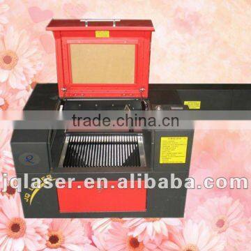 JQ 4030 MINI name tags laser enrgaving machine