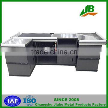 checkout counter with sensor conveyor belt