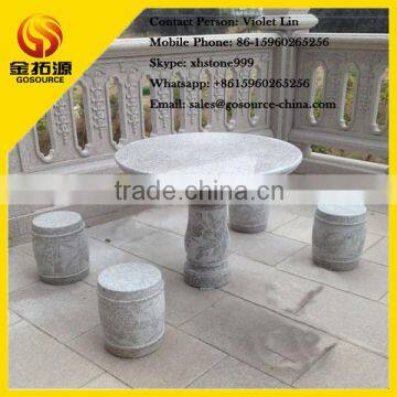 stone garden table set with stools