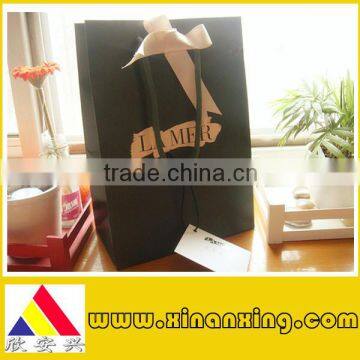 decorative paper bag with ribbon, gift paper bag