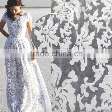 Wholesale Fancy sequins lace fabric for bridal and girls dress white sequined mesh lace french net lace textile                        
                                                Quality Choice