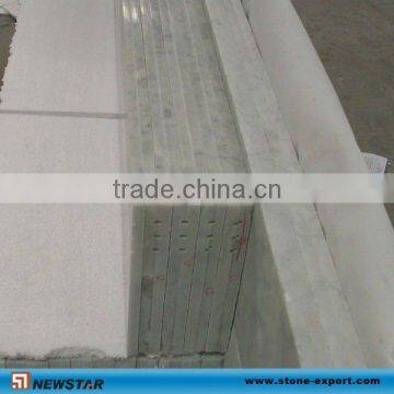 white marble stairs railing