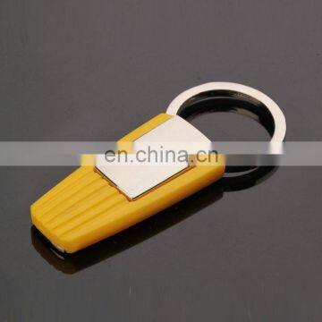 Wholesale Simple Cheap yellow Color metal rubber Keychain with laser logo