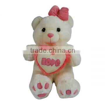 Cute plush bear with heart pattern