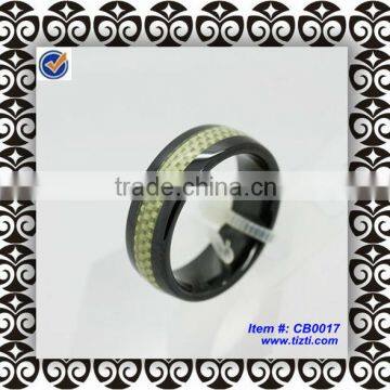 Black ceramic ring with carbon fiber inlay