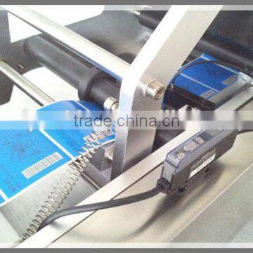 Semi-automatic Round Bottle Glue Labeling Machine LT-50 photo-6