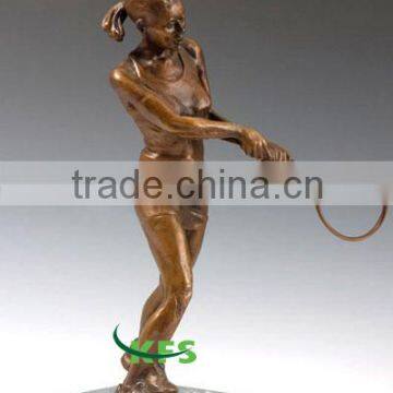 Brass lady playing golf statue