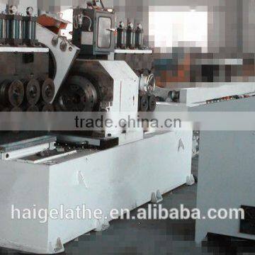 bar peeling centerless lathe with loading and unloading device