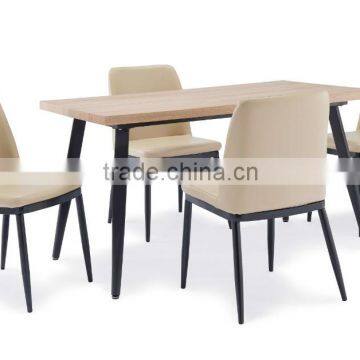 Wooden top dining table with 4 pu chairs with black powder coated leg