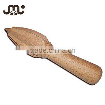 Small simple unfinished wooden lemon juicer