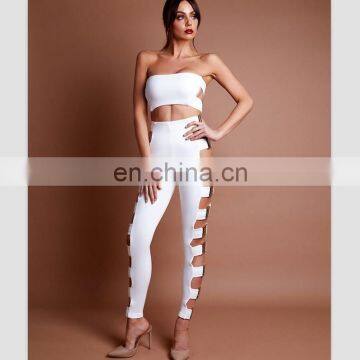 Amigo 2017 new design two piece sexy party wear long bandage pants suit with dew chest metal crop top and cut out pants