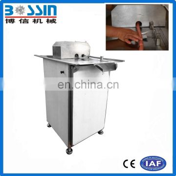 Pneumatic sausage linker machine for hot dog tying