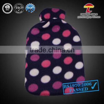 large AZO hot water bottle with fleece cover colorful little round dots