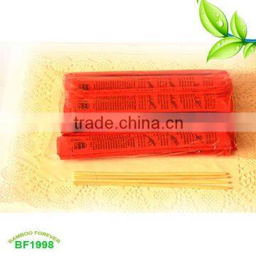 Paper wrapped tensogue bamboo chopsticks wirh bamboo knot