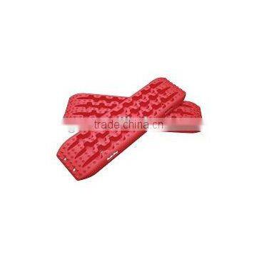 red plastic sand track
