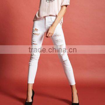 The new young girls design xxx usa style women's jeans in fashion that super skinny and have ripped washed