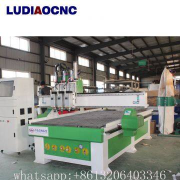 Automatic Three Spindles CNC Router Machine for Wood Cabinet Door Making photo-2