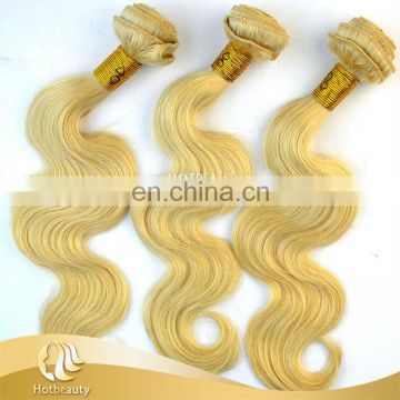 Hot sale natural blonde curly hair extensions, human hair body wave.