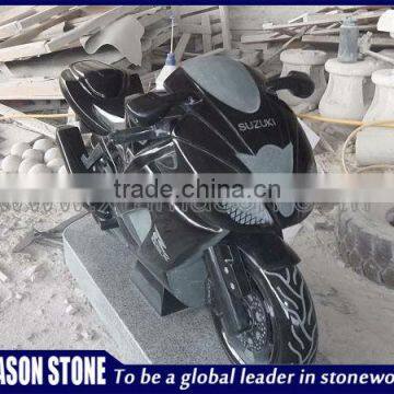 Black granite motorcycle sculptures