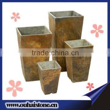 All sorts of types various sizes rusty slate stone handmade plant pot