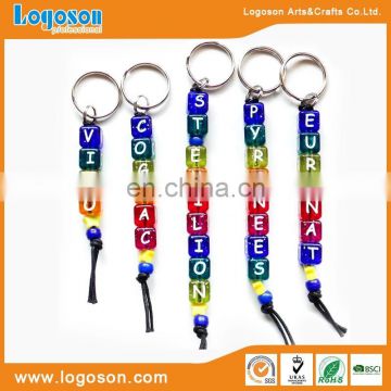 Promotional souvenir gifts cheap customized logo plastic alphabet key chains