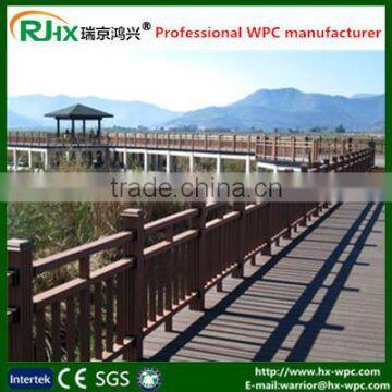 Exterior wall cladding with extruded plastic composite decking for outdoor bridge or garden wall fencing