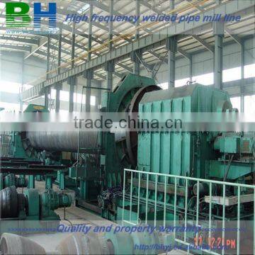 Steel pipe cutting and beveling machines