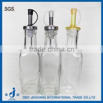 Glass sauce dispenser bottle with cap