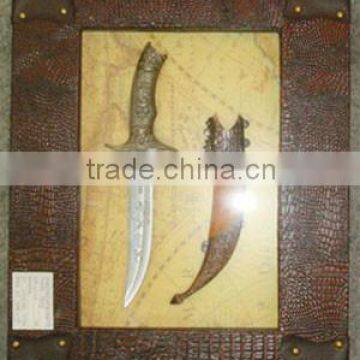 wooden frame with hand crafted knife