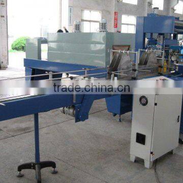 Shrink packing and wrapping machine