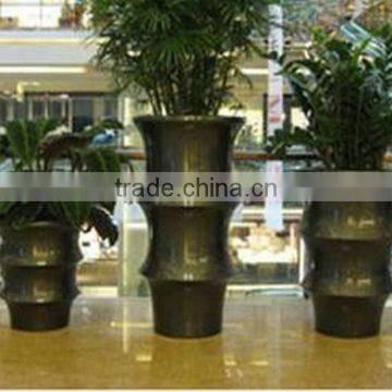 Golden fiberglass planter flowerpot