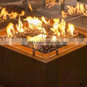 corten steel outdoor freestanding gas fireplace with rusty look