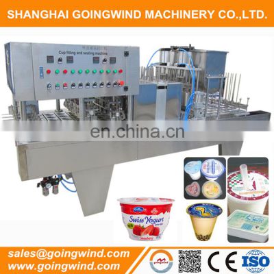 Automatic yogurt cup filling sealing machine four heads jelly yoghurt plastic cups auto packaging machinery cheap price for sale