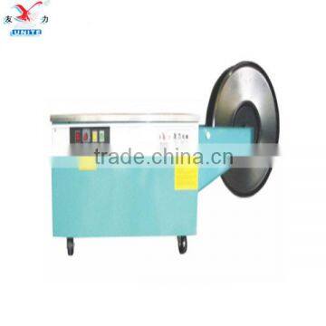 Semi-automative strapping machine