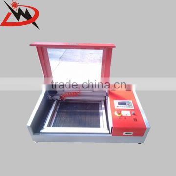 China Alibaba supplier 6040 non-metal co2 laser engraving and cutting machine for small business